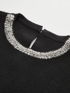 Sleeveless Flared Dress with Sequin Embellishments