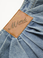 Asymmetric Pleated Denim Mini Skirt
